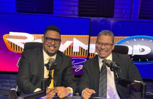 Raymond-Right-Now-podcast-host-and-guest-smiling-in-suits