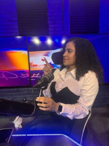 Raymond-podcast-guest-pointing-at-microphone