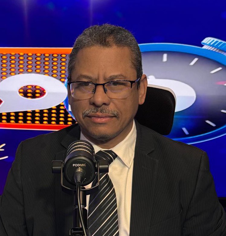 latino-man-podcast-studio-glasses