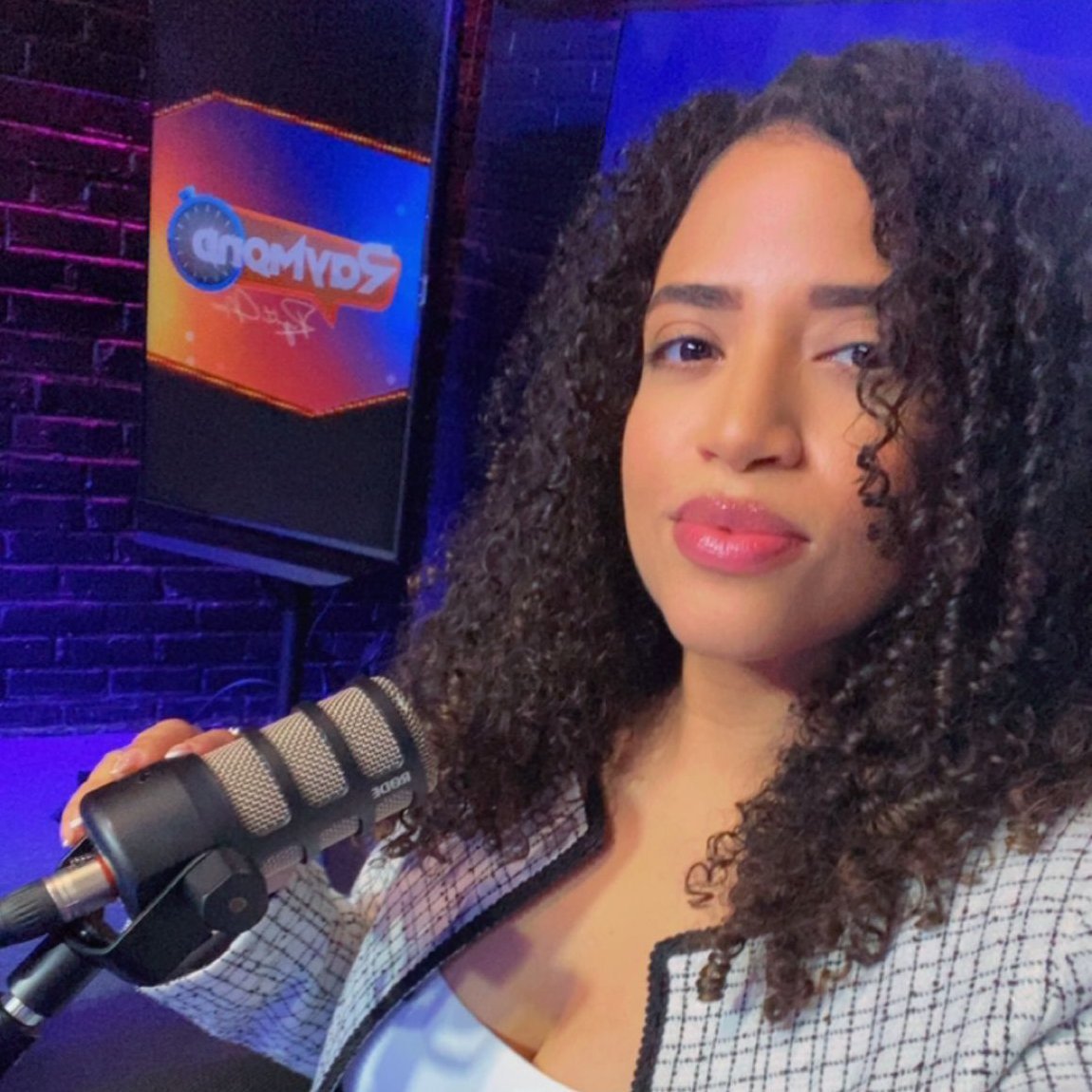 latina-woman-microphone-podcast